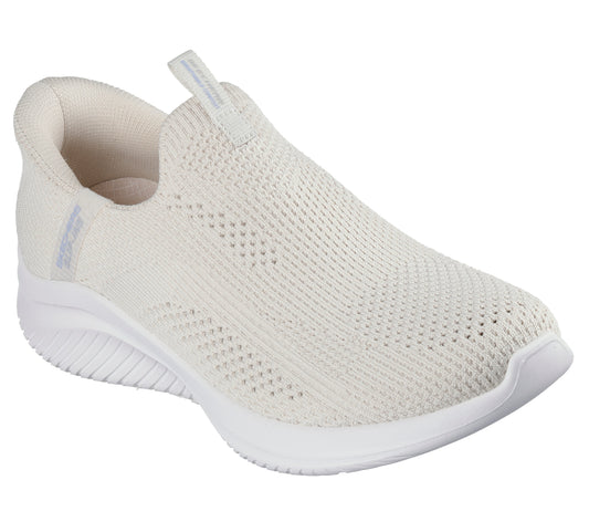 A slip-on walking shoe with a knit upper and white soles.