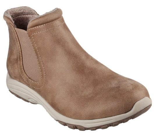 A light brown suede-like low-rise boot with elastic ankle inserts and a thick, cream-colored sole.