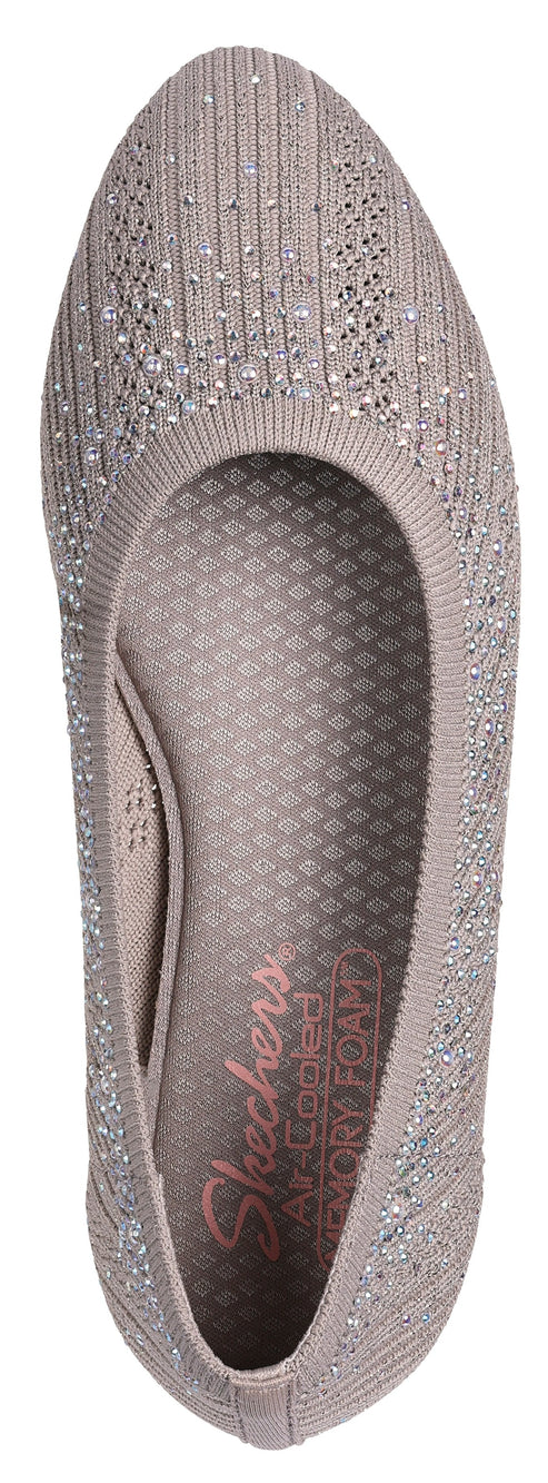 A sparkly taupe ballet flat from above, showing the insole which has a diamond pattern and a logo that reads "Skechers AIR-COOLED MEMORY FOAM".