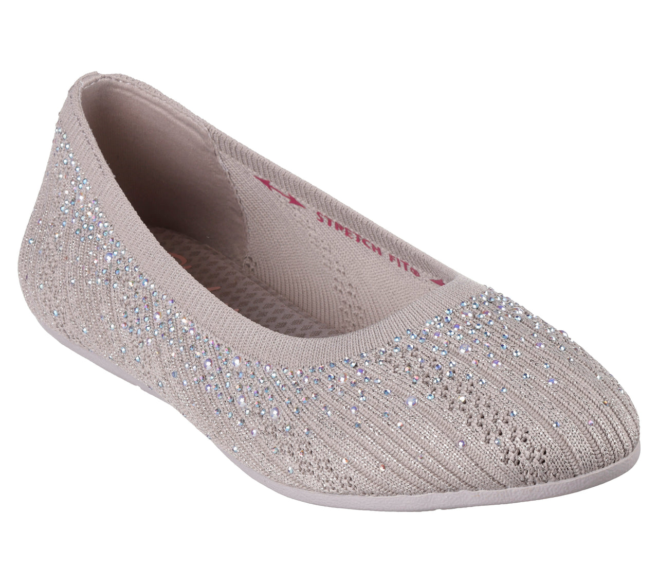 Beige ballet flat with decorative silver accents.