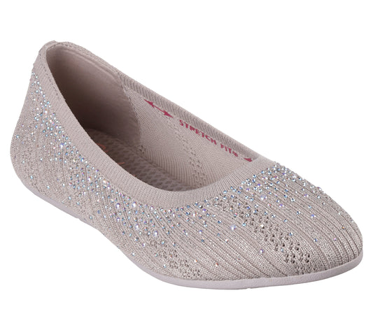 Beige ballet flat with decorative silver accents.
