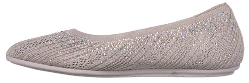 A light beige ballet flat with small glittery embellishments.