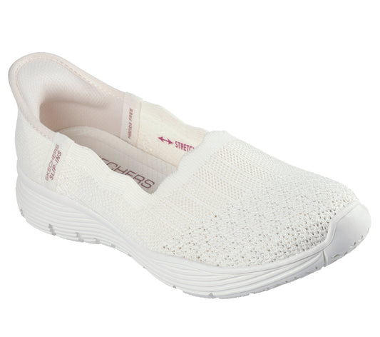 White slip-on shoe with a stretch fit and a knitted upper.