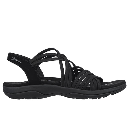 Black sandal with multiple slender straps crisscrossing over the foot and an ankle strap labeled "Skechers".
