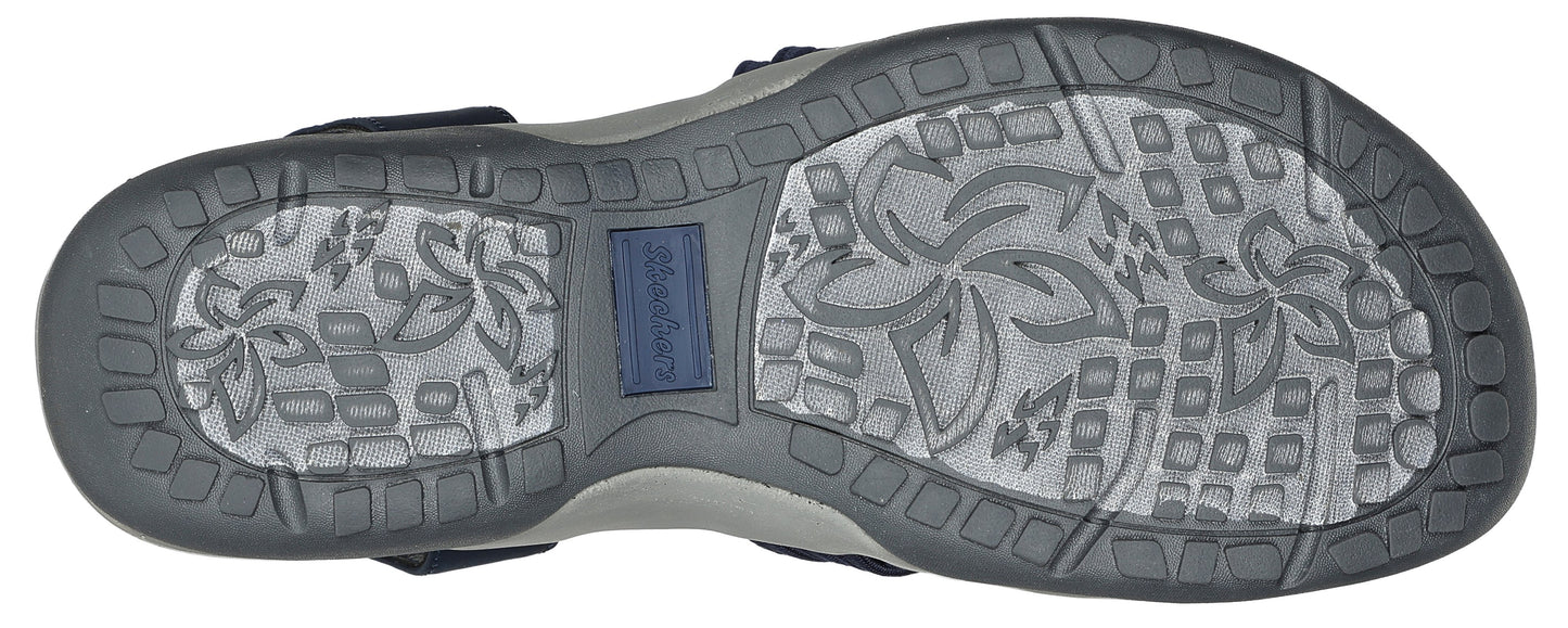 The sole of a sandal with a floral pattern.