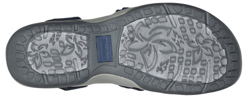 The sole of a sandal with a floral pattern.