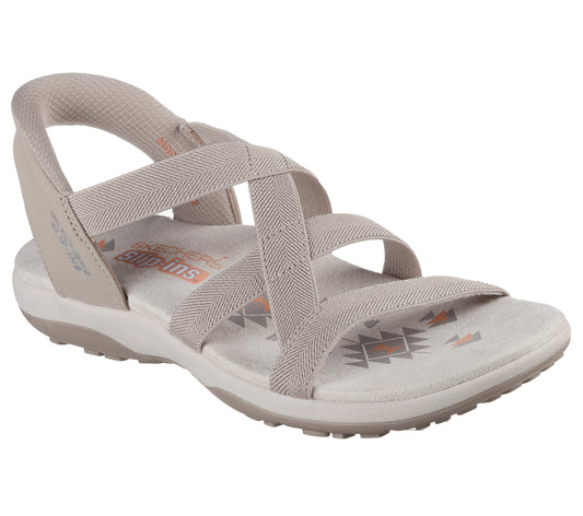 Beige sandal with elastic straps and printed insole.