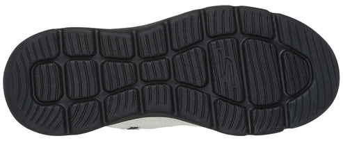 Close-up of the black patterned sole of a shoe.