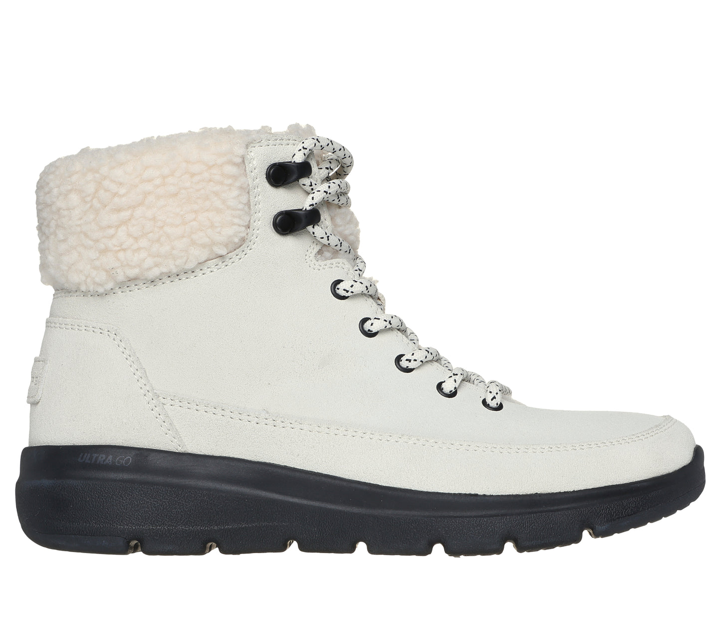 A white ankle-high boot with a black sole and a sherpa wool collar.