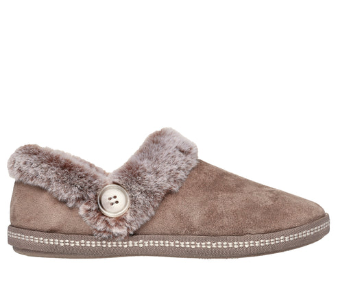 Taupe slipper with faux fur trim and button detail.