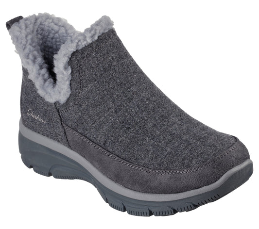 Gray slip-on shoe with faux fur trim.