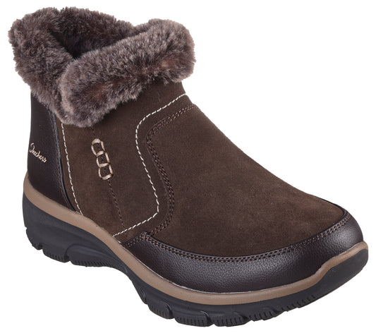 Brown suede ankle boot with faux fur trim and a dark brown sole.
