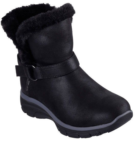 Black ankle boot with faux fur trim and buckle strap.