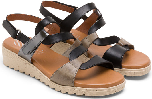 A pair of women's platform sandals in black and metallic colors with buckle straps.