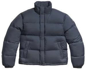 A dark navy blue puffer jacket with a high collar, long sleeves, front pockets, and a front zip closure, shown against a plain background.