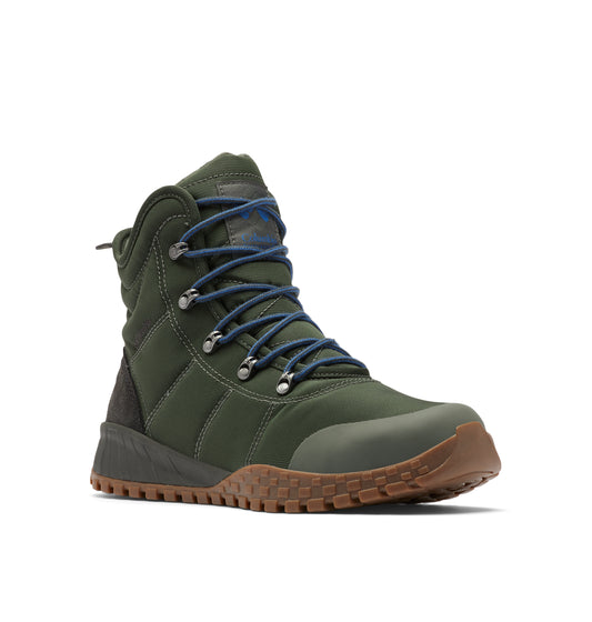 Olive green quilted ankle boot with blue laces and a brown lug sole.