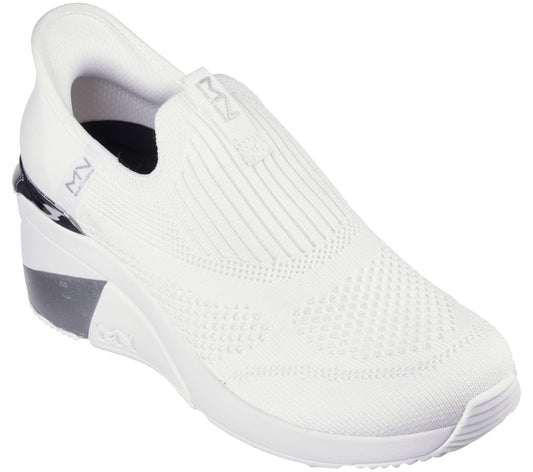 A white knit slip-on sneaker with visible ribbing at the vamp, a pull tab, and a black accent at the heel.