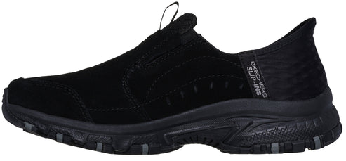 A black slip-on shoe with a raised heel.