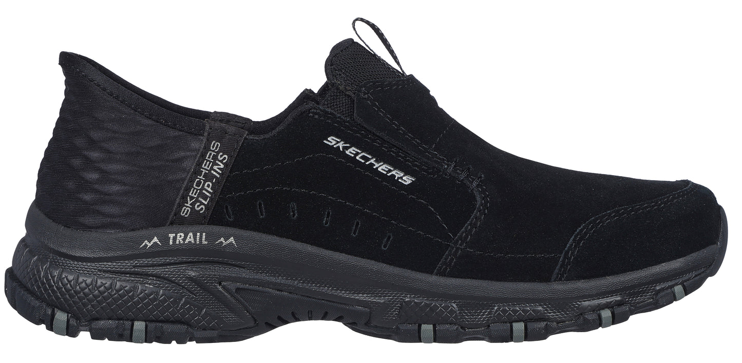 Black slip-on trail shoe with the word SKECHERS on its side.