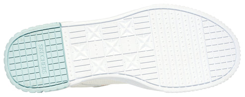 The sole of a shoe with a grid-like pattern on the heel and a dot pattern on the front.