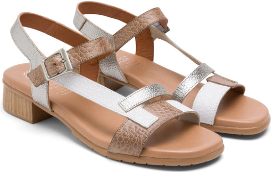 Two open toe sandals with silver and textured gold straps and a low block heel.