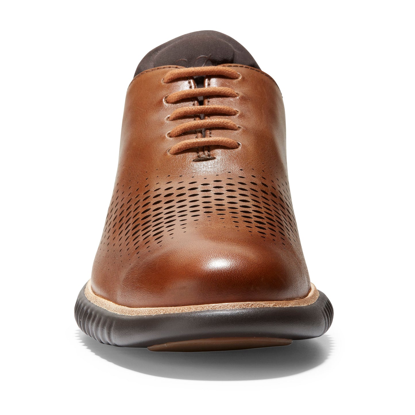 A brown leather lace-up shoe with perforated details.