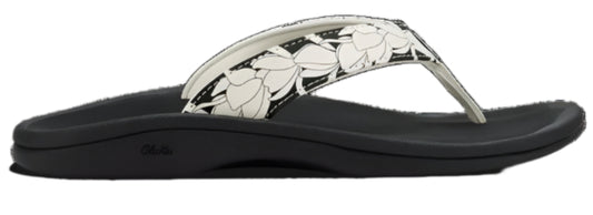 A black and white sandal.