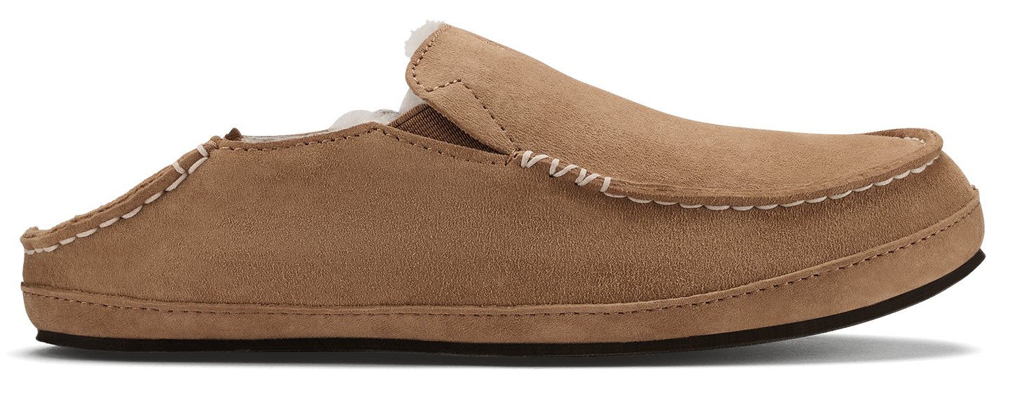 Tan suede moccasin slipper with white stitching.