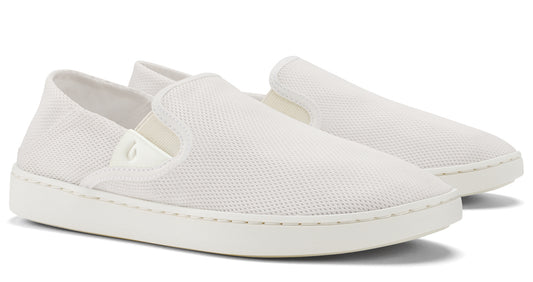Two white slip-on shoes with white soles.