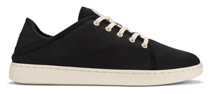 A black canvas sneaker with off-white laces and a white sole.