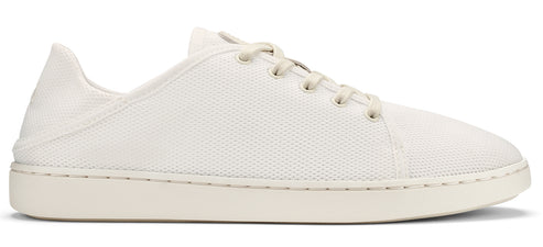A side-view of a white mesh sneaker with white laces and a thick white sole.