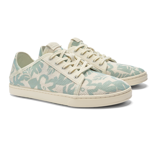 Low-profile lace-up sneakers with a plant pattern.
