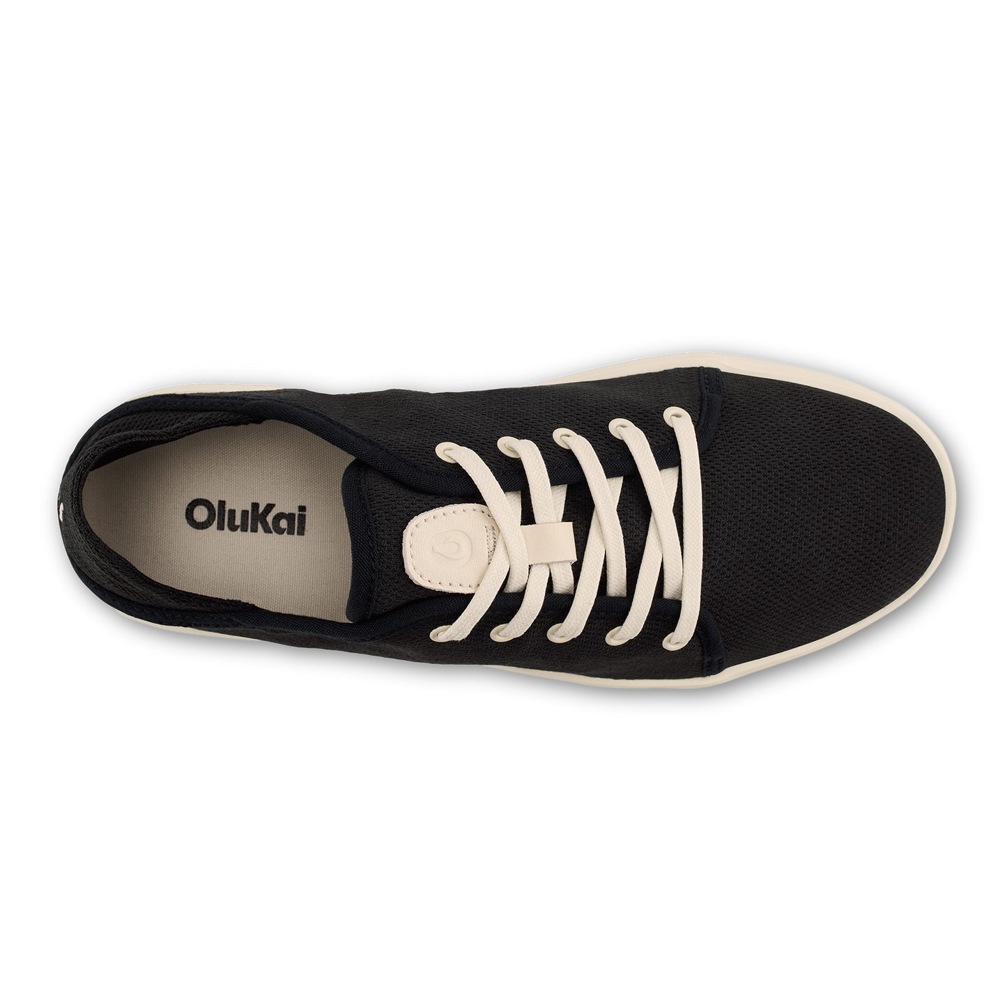 Top-down view of black sneaker with white laces and "Olukai" label visible on the insole.