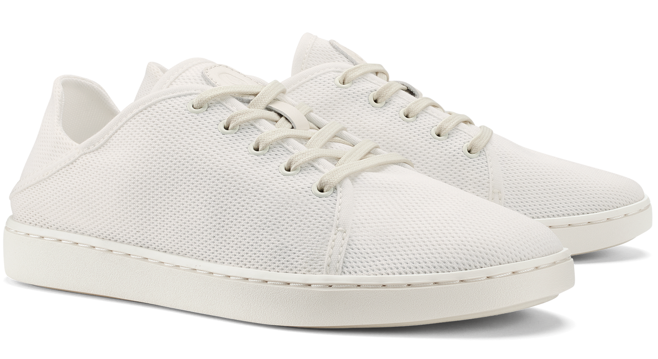 Pair of white canvas tennis shoes.