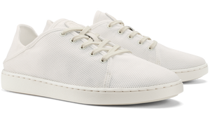Pair of white canvas tennis shoes.