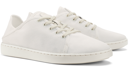 Pair of white canvas tennis shoes.