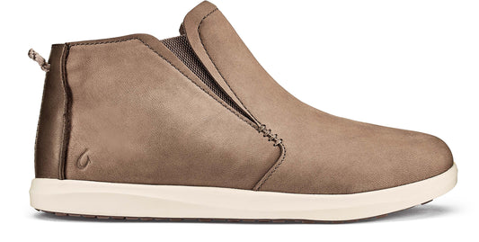 Taupe colored slip-on shoe with white soles.