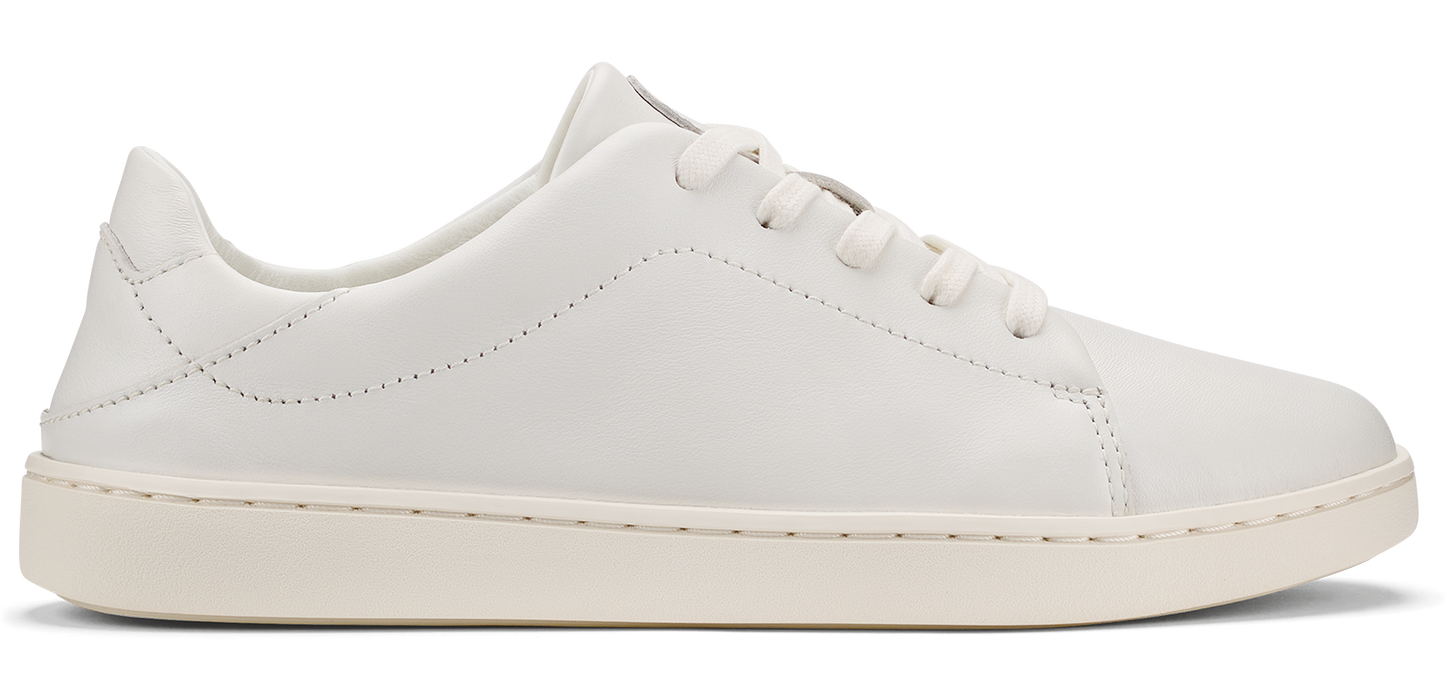 A white leather sneaker with a matching sole and laces.