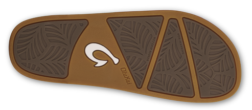 Brown sandal sole with textured leaf pattern and OluKai logo.