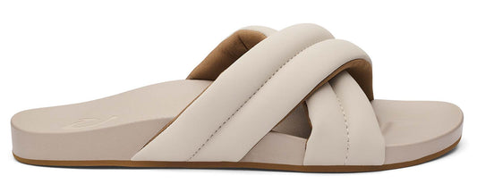 Beige slip-on sandal with thick, criss-cross straps.