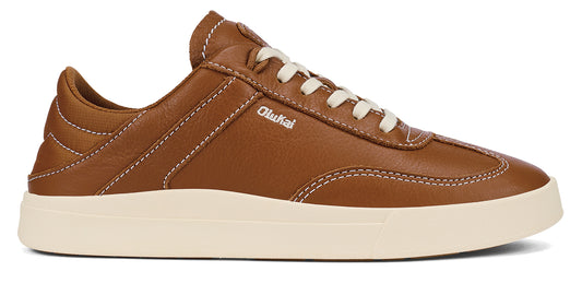 Brown leather shoe with white soles and laces, 'OluKai' printed on the side