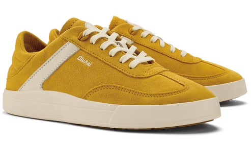 Low-profile, yellow suede shoe with white laces and a white stripe.