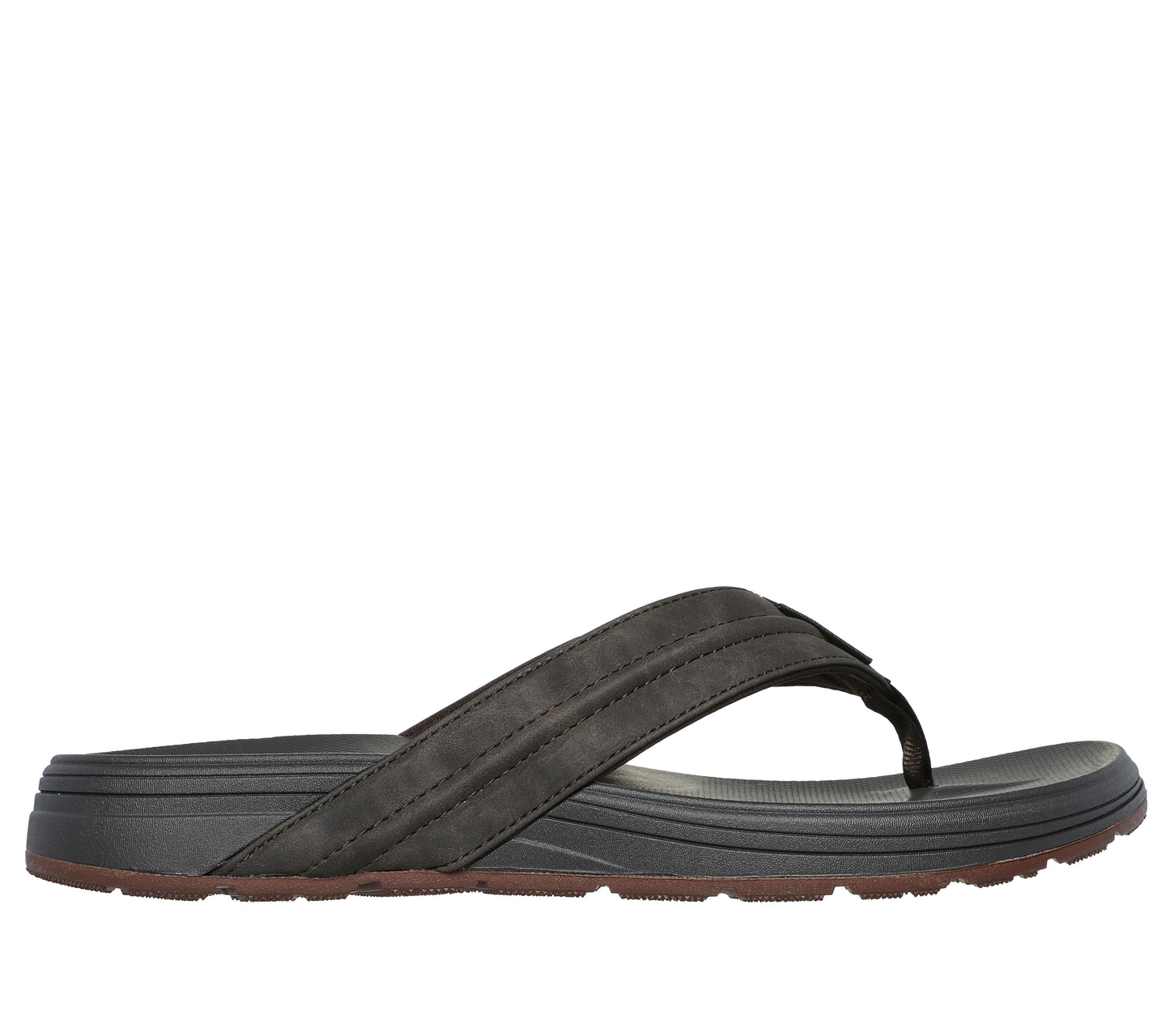 Side view of a gray thong sandal with brown soles.