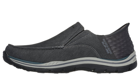 Gray slip-on shoe with black sole and 'SKECHERS SLIP-INS' text on heel