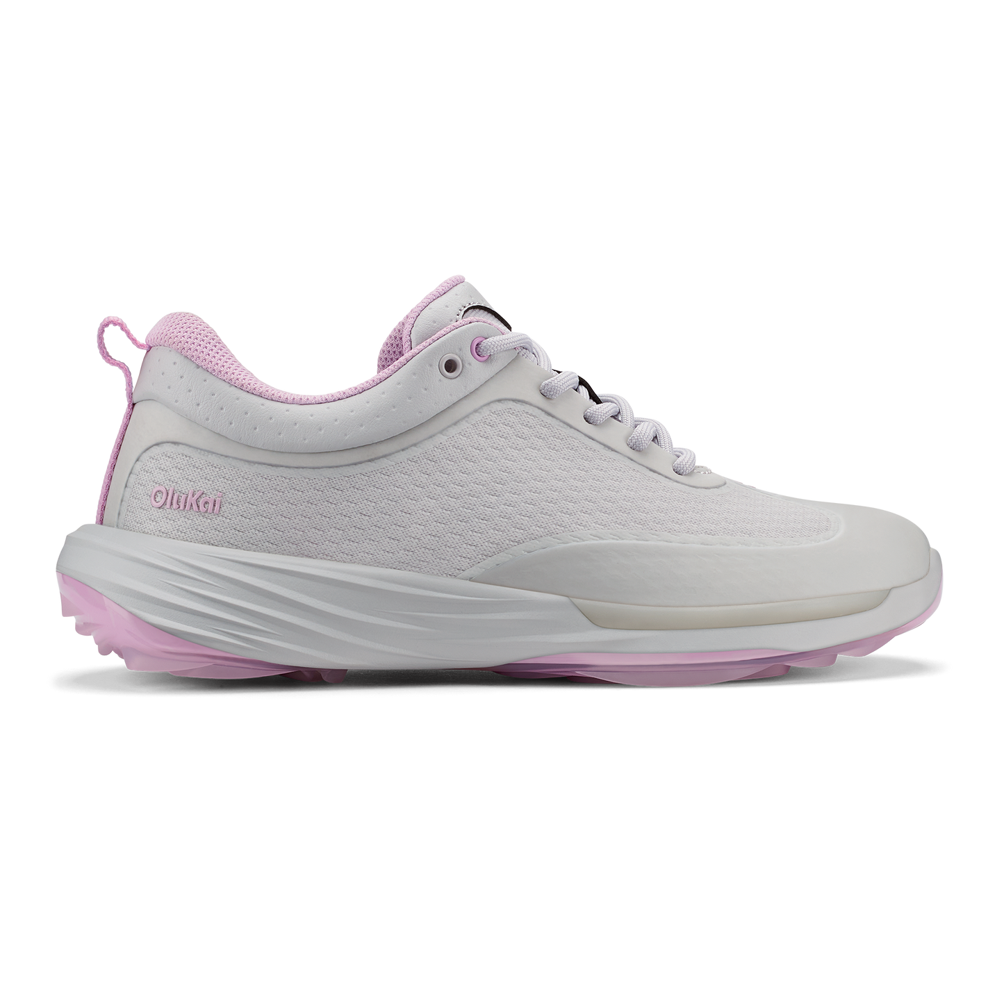 A women's athletic sneaker in light gray with pastel pink accents on the inner lining, heel pull tab, and outsole, featuring a textured side panel, white laces, and the embossed word OlinKai on the side.