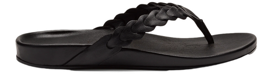 A black sandal with a braided strap.