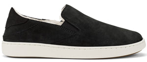Black slip-on shoe with a white sole and white fuzzy lining.