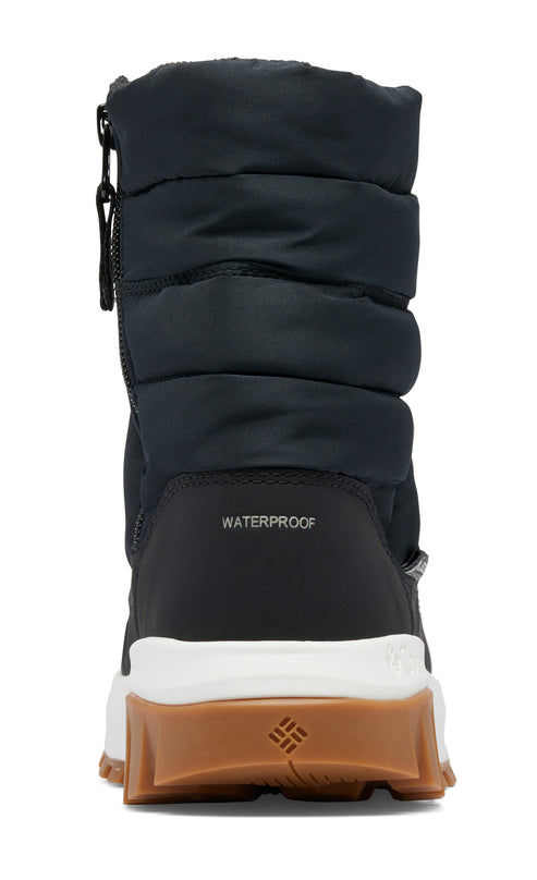 Rear view of black puffy boot with side zipper and waterproof label above a white and brown sole.