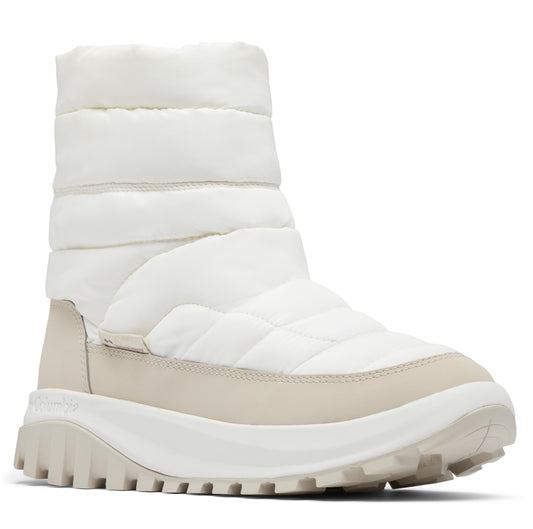 A white quilted puffer boot with a beige sole.