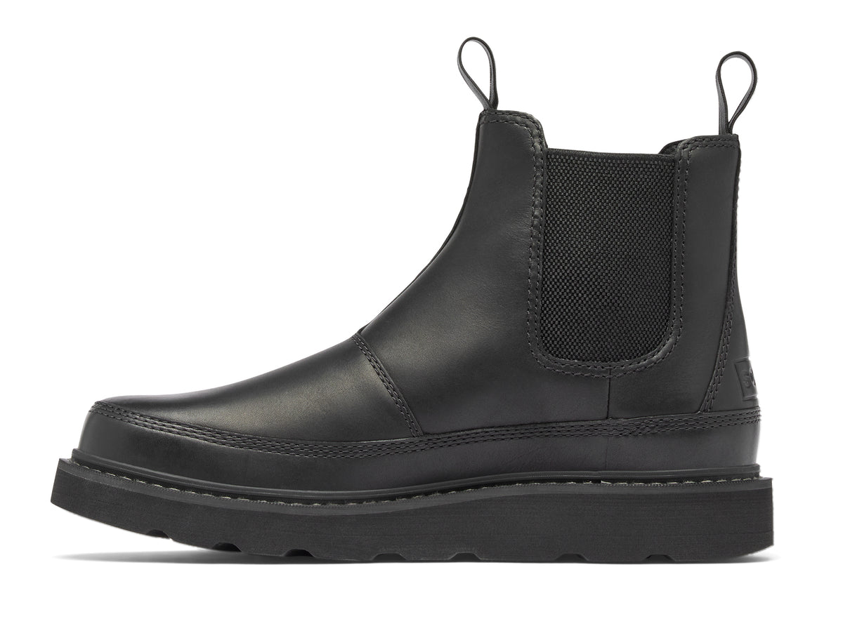 Black leather chelsea boot with pull tabs and a chunky sole.